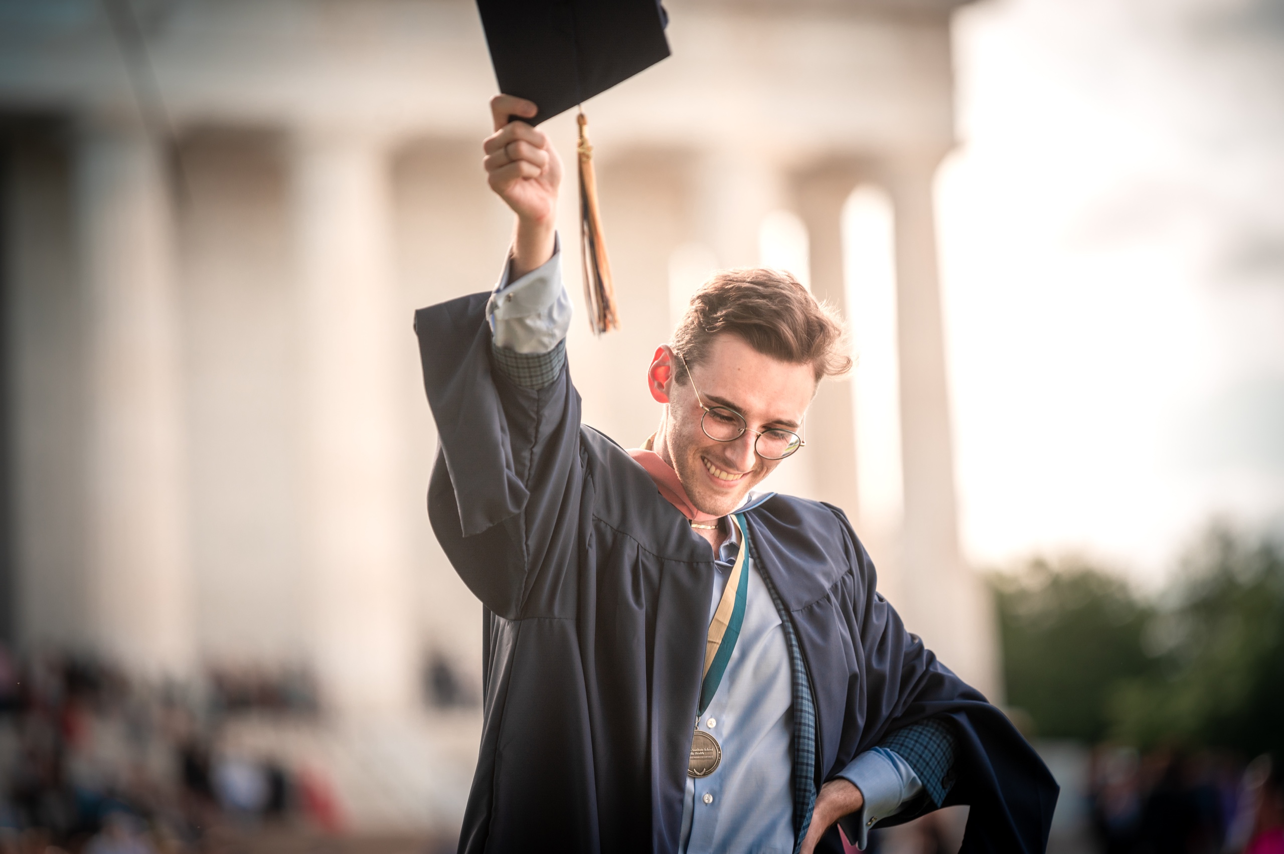Bright graduation portrait with joyful expression